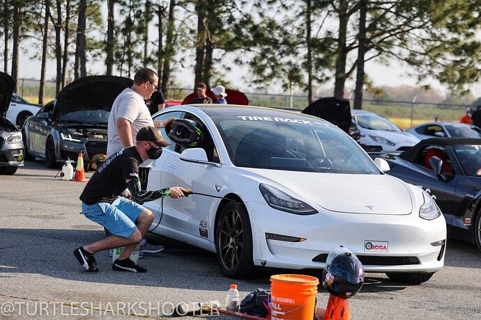 Spraying Tires for Tesla Model 3 Autocross